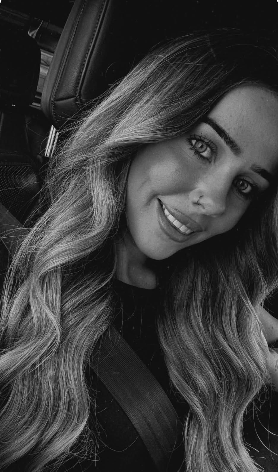 Long highlighted hair styled in soft waves